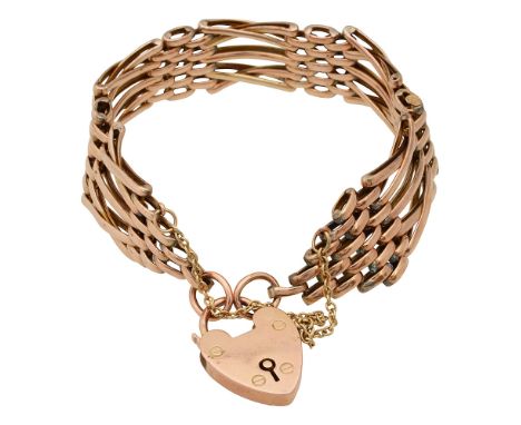 An Edwardian 9ct rose gold gate bracelet with heart padlock and safety chain approx weight 19.7gCondition: In good overall co