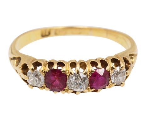 An Edwardian diamond and ruby five stone ring set with three old brilliant-cut diamonds and two circular-rubies, pierced gall