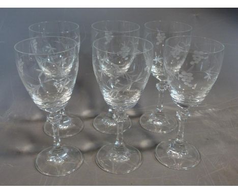 Collection of glass. Including a whitefriars style red geometric vase, a set of engraved wine glasses with grape motifs and a