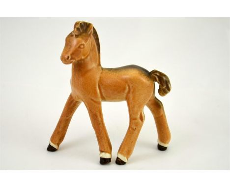 A Poole Pottery figure of a horse. Height 11cm.
