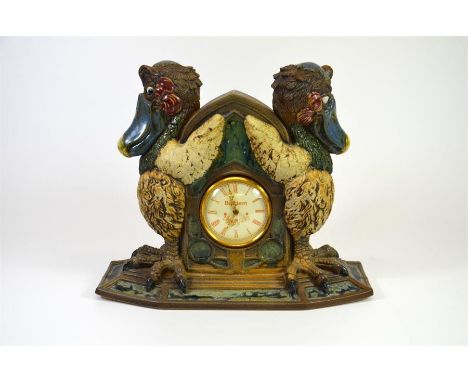 A Burslem pottery trial stoneware grotesque bird clock 'Caught in time', modelled differently than the normal model as both o