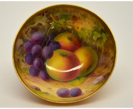 A Royal Worcester bowl with fruit decoration, signed A Shuck and date code for 1921. Printed marks. Diameter 10.5cm.