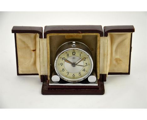An art deco style DEP Savoy clock in a case.