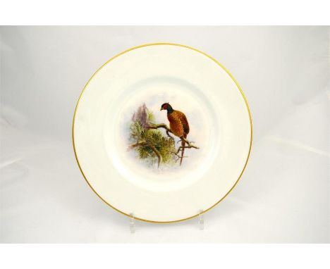 A Royal Worcester plate, 'Pheasant', date code for 1953 and printed marks. Diameter 26.5cm.