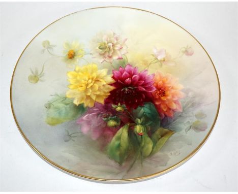 A Royal Worcester plate, depicting flowers, signed Cole. Puce printed marks. Diameter 26cm.