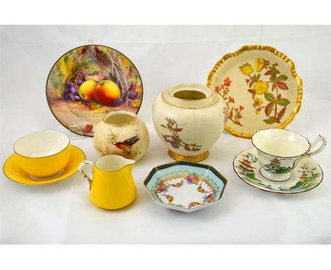 Nine pieces of Royal Worcester including a cup, saucer and milk jug, cup and saucer, small plate, posy vase, pot and a dish (