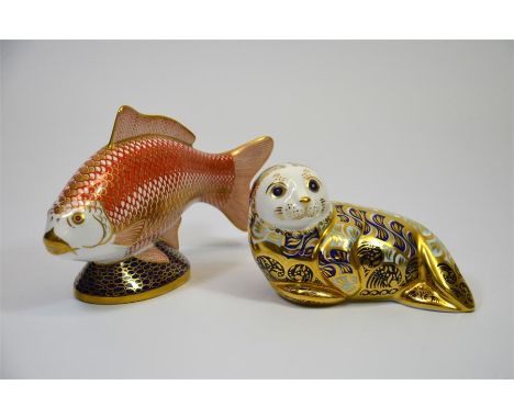 Two Royal Crown Derby paperweights, Golden Carp and a Harbour Seal. Both with gold stoppers and boxes. (2)