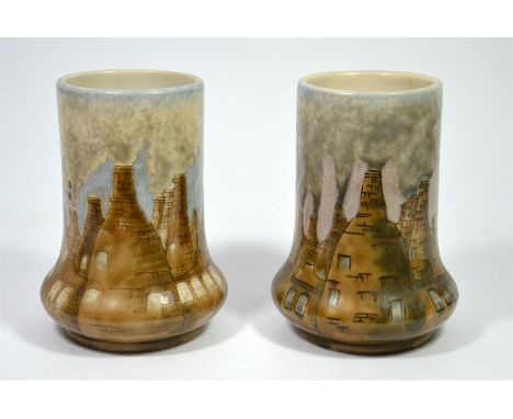 A pair of Cobridge stoneware vases, 'Bottle Kiln' designed by Phillip Gibson. Dated 98. Impressed and painted marks. Height 1