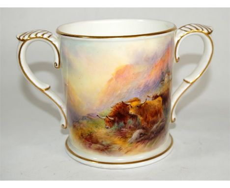 A small Royal Worcester loving cup, decorated with cattle, signed by H Stinton. Date code 1926. Puce printed marks. Height 18