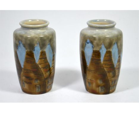 A pair of Cobridge stoneware vases, 'Bottle Kiln' designed by Phillip Gibson. Dated 98. Impressed and painted marks. Height 1