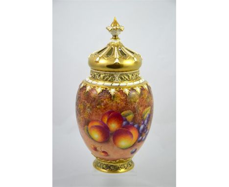 A Royal Worcester pot pourri, decorated with fallen fruit on a mossy bank.  Signed D Shinnie with printed black marks.  Heigh