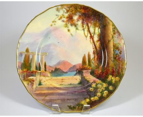 A Royal Worcester plate, Italian lakes scene, signed G.H. Evans and date code for 1935. Printed marks. Diameter 27cm.