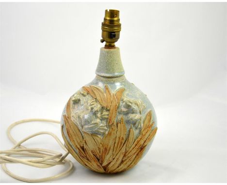 A Bernard Rooke frog lamp base, decorated with frogs in high relief. Height 22cm.