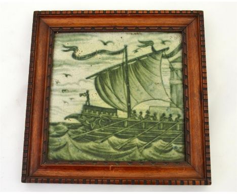 A William De Morgan tile, decorated with half a galleon. Framed. Impressed marks. Dated 1898. 15cm x 15cm.