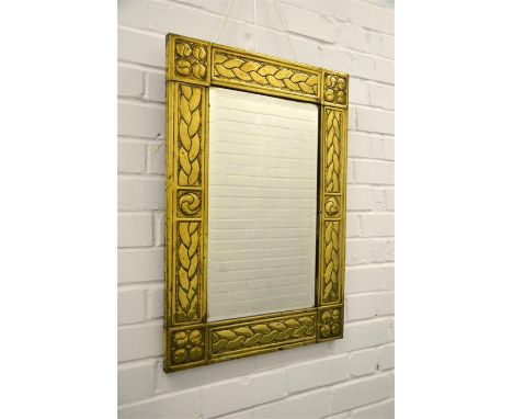 An arts and crafts brass mirror, with Celtic design. 48cm x 69cm. Note: purchased in Belfast.