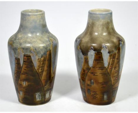 A pair of Cobridge stoneware vases, 'Bottle Kiln' designed by Phillip Gibson. Dated 98. Impressed and painted marks. Height 1