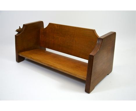 A Yorkshire Wrenman (Bob Hunter) oak book trough. 47cm x 19cm x 20.5cm. Note: Bob Hunter was a student of Mouseman