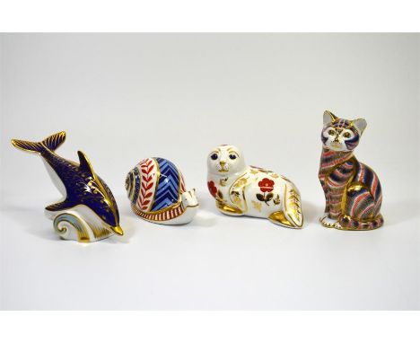 Four Royal Crown Derby paperweights, Cat, Seal, Snail and a Dolphin. All with gold stoppers and boxes. (4)