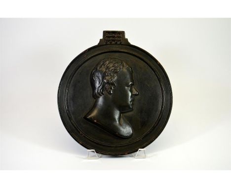 A 19th century cast iron circular portrait relief plaque of a gentleman. Diameter 29cm.