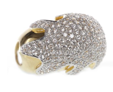 EIGHTEEN CARAT GOLD GEM SET BOMBE RINGwith grain set round white gems, pierced shank, size M-N, 14.6g