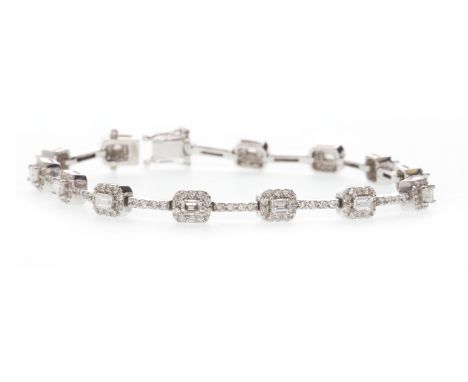 EIGHTEEN CARAT GOLD DIAMOND BRACELETeach section set with a step cut diamond surrounded by round brilliant cut diamonds, inte