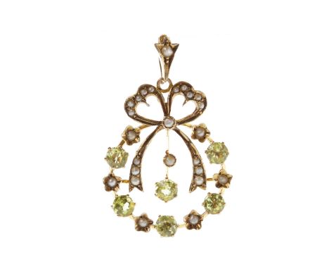 EARLY TWENTIETH CENTURY PERIDOT AND PEARL PENDANTof openwork form, the circumference set with round green stones interspaced 