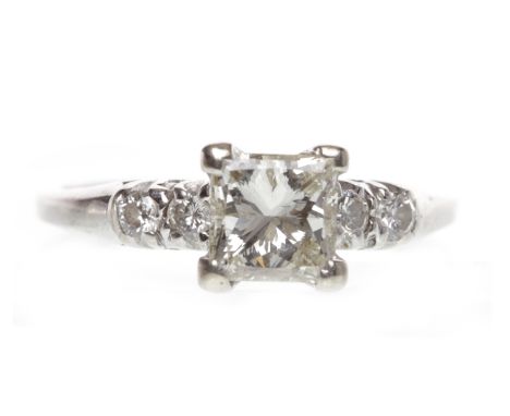 FOURTEEN CARAT WHITE GOLD DIAMOND SOLITAIRE RINGwith a four claw princess cut diamond of approximately 0.80 carats, on round 