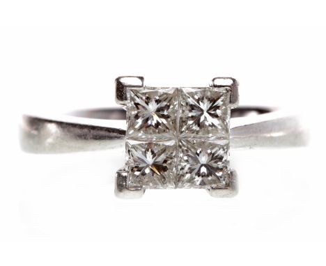 PLATINUM DIAMOND DRESS RINGwith a square bezel set with four princess cut diamonds totalling approximately 0.65 carats, size 