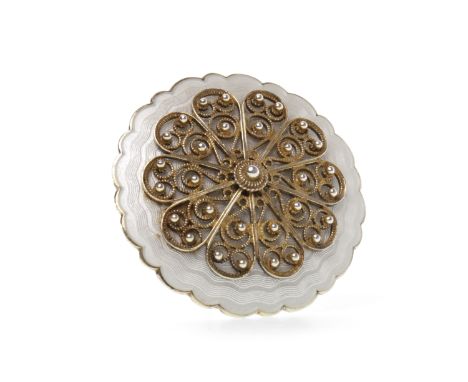 NORWEGIAN SILVER GILT ENAMELED BROOCHwith white enamel and overlaid looped silver gilt sections, 43mm diameter, 21g
