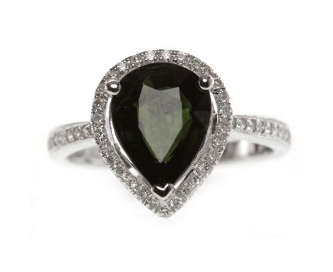 FOURTEEN CARAT GOLD TOURMALINE AND DIAMOND RINGset with a central pear shaped tourmaline of approximately 2.00 carats within 