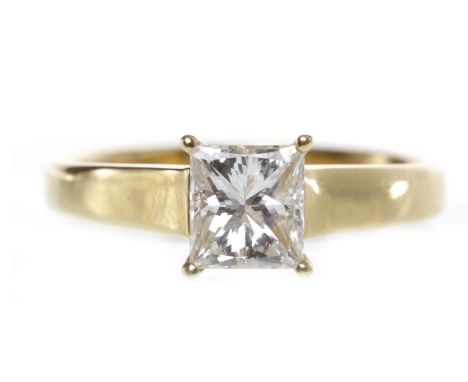 EIGHTEEN CARAT GOLD DIAMOND SOLITAIRE RINGset with a four claw set princess cut diamond of approximately 1.00 carat, size M-N