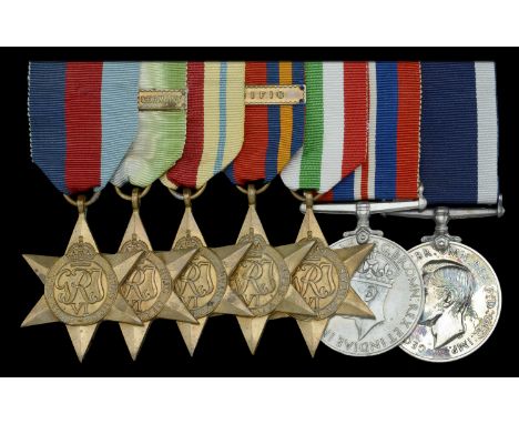 Seven: Chief Mechanician C. H. Offord, Royal Navy, who served in H.M.S. Belfast at the battle of North Cape in December 1943 