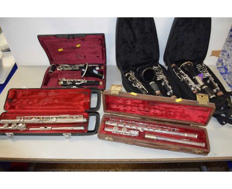 Mixed Lot: Three various cased clarinets to include an example marked Buffet, Paris together with two further silver plated f