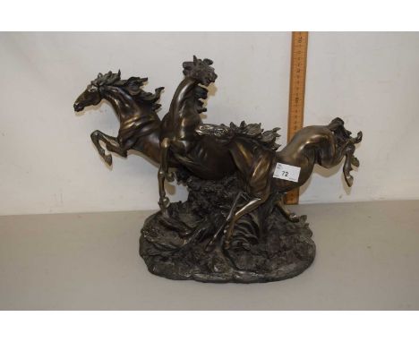 A modern Academy bronzed resin model of three horses