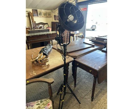 Modern studio type floor standing lamp with tripod base