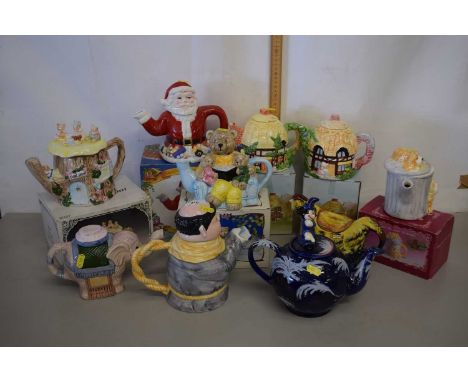 Collection of various model novelty teapots