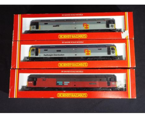 Model Railways - Hornby OO gauge three class 7 diesel locomotives (appear to be have been repainted and renumbered) in boxes,