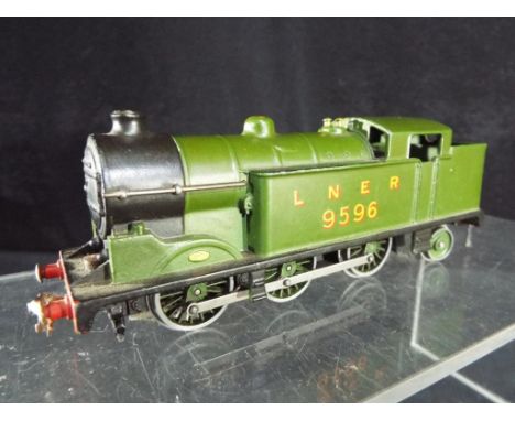 Hornby - An unboxed Hornby three - rail tank locomotive, No 9596 in green LNER livery, model appears in VG condition. Est £20