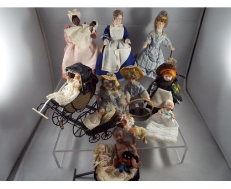 Dolls House Accessories - a good mixed collection of doll's house accessories to include eleven ceramic faced dressed dolls c