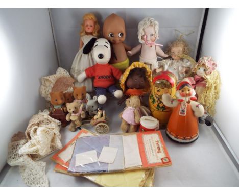 A good mixed collection of vintage dolls to include a plastic Kewpie doll, a celuloid sleeping eyed doll, a small collection 