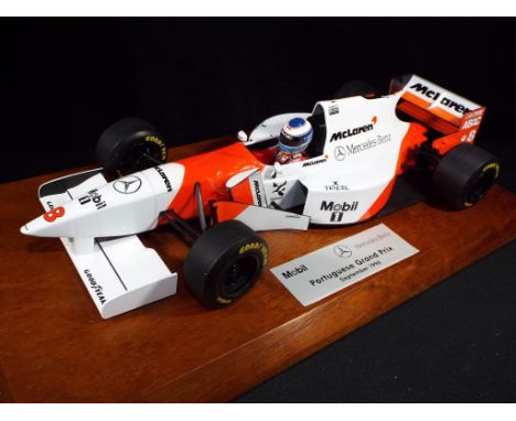 Diecast - Minichamps -  1:18 scale F1 McLaren MP4/10 driven by Mika Hakkinen, model was produced as gift for Mobil 1 team wit