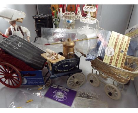 Dolls House Accessories - a collection of in excess of twenty items of good quality doll's house furniture to include a repli