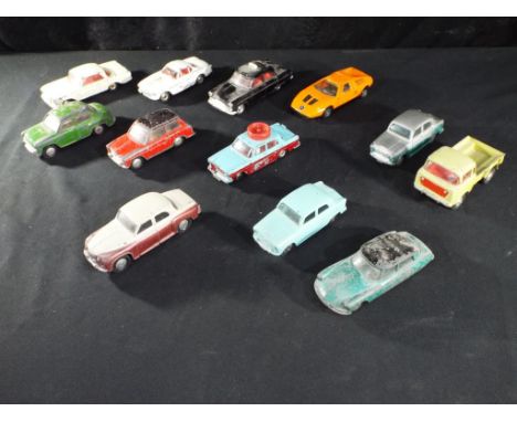 Diecast - Corgi - twelve unboxed diecast vehicles to include a Rover 90, Austin Cambridge, Morris Cowley and similar, items a