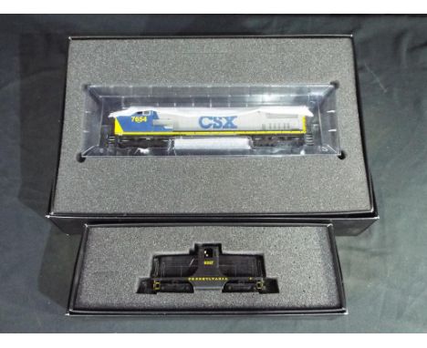 Model Railways - Bachmann HO gauge, two diesel locomotives comprising 80038 a 44 ton diesel switcher DCC ready and 86011 a GE