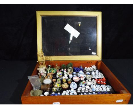 Dolls House accessories - a glass fronted display box, containing a good mixed lot of quality dolls house accessories to incl