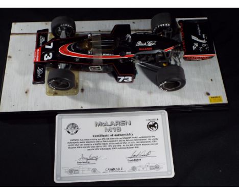 Carousel - McLaren M16 1974 Indianapolis 500 as raced by David Obbs in 1:18 scale, model is mint but slightly dusty, in excel