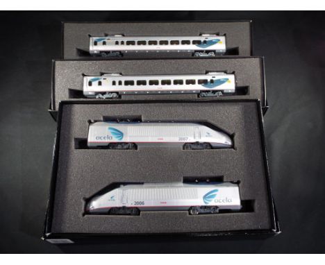Model Railways - Bachmann HO gauge American Acela Express with dual locomotives and two carriages ref 89942 x 2 and 81949, it
