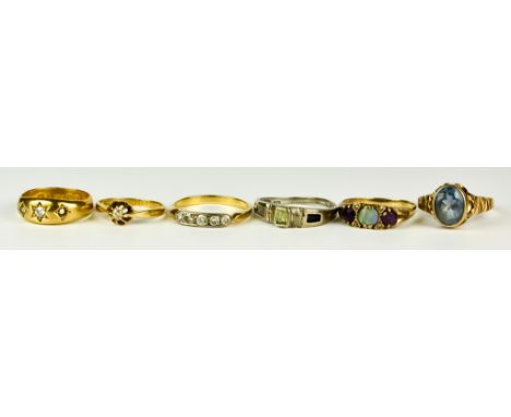 Six Gem Set Rings, 20th Century, comprising - 22ct gold gypsy ring set with two small white stones, size M, gross weight 4.6g