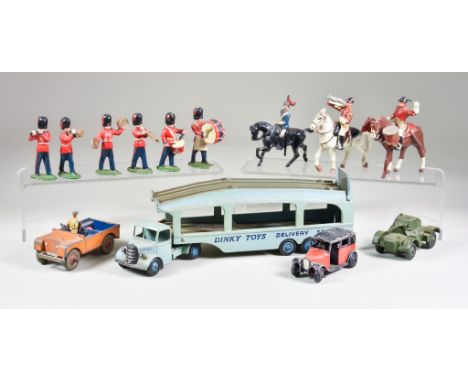 A Quantity of Dinky Toys and Britains Soldiers, including - Dinky delivery service car transporter, Land Rover, two armoured 