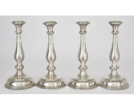 A Set of Four Austrian Silver Pillar Candlesticks, maker's mark rubbed possibly T D, 800 standard, with baluster shaped stems